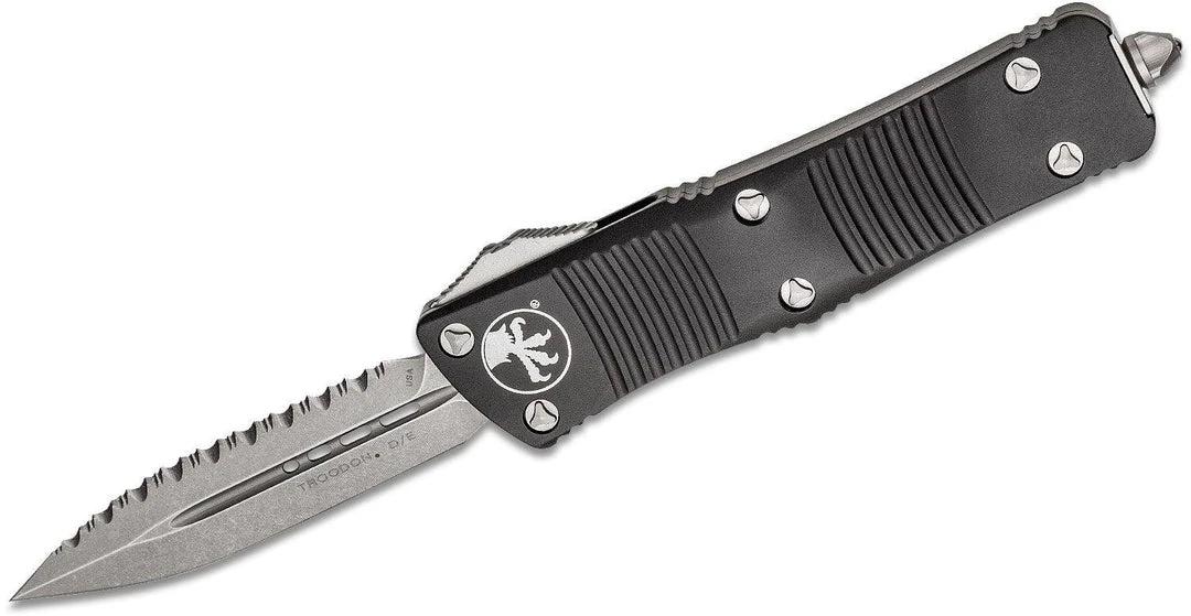 All Knife Brands Microtech 138-12 Troodon D/E F/S - Black Handle - Full Serrations - Stonewash Blade 1 All Knife Brands Microtech 138-12 Troodon D/E F/S - Black Handle - Full Serrations - Stonewash Blade