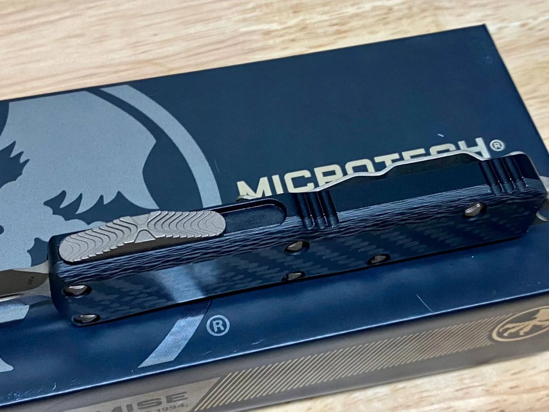 Microtech UTX-85 D/E SS Carbon Fiber Top Bronze Apocalyptic 232-13APCFS 2 Microtech UTX-85 D/E SS Carbon Fiber Top Bronze Apocalyptic 232-13APCFS